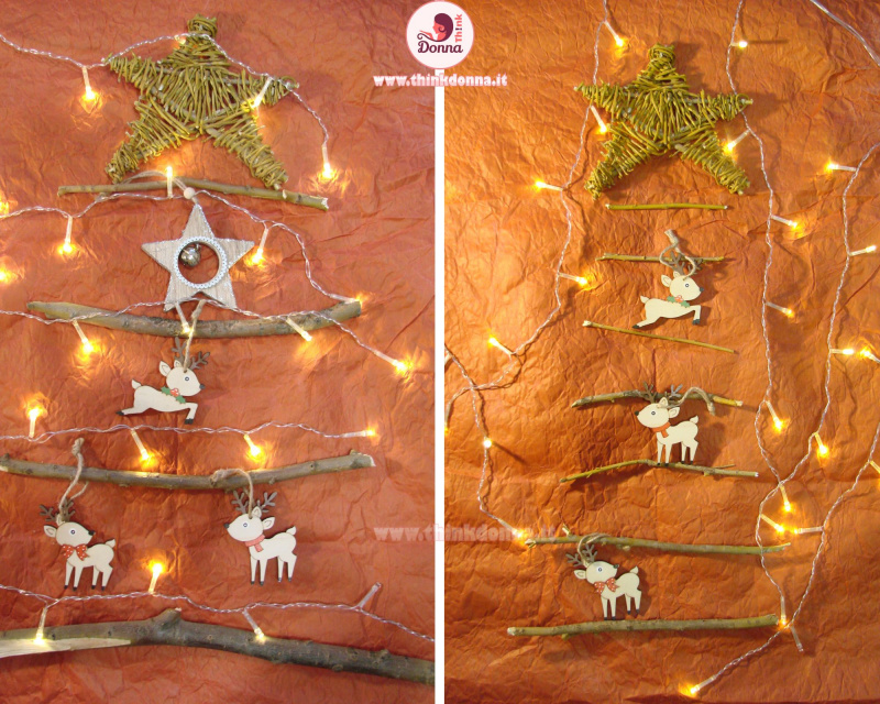 stringhe di luci formano albero di Natale alternativo stella rami secchi piccole renne di legno