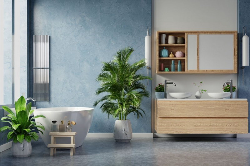 arredo bagno vasca pianta foglie verdi profumi due lavabi mobile cassetti