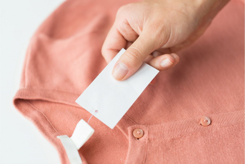 cartellino etichetta commerciale capo abbigliamento