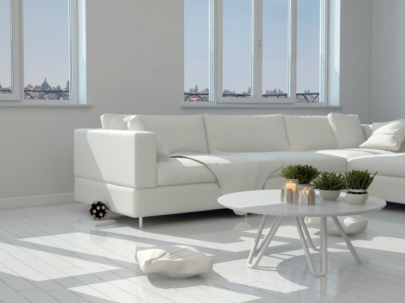 soggiorno divani total white pareti bianche finestre luce
