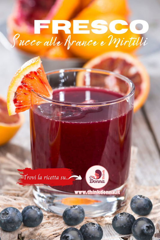 bicchiere di vetro con succo di frutta arancia mirtilli ricetta ingredienti