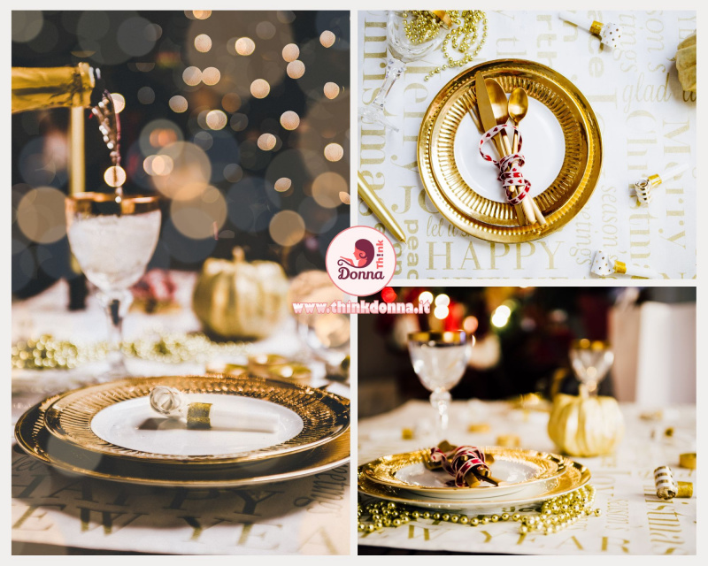 festeggiamenti fine anno posto tavola apparecchiata spumante versato calice piatti oro luci perle
