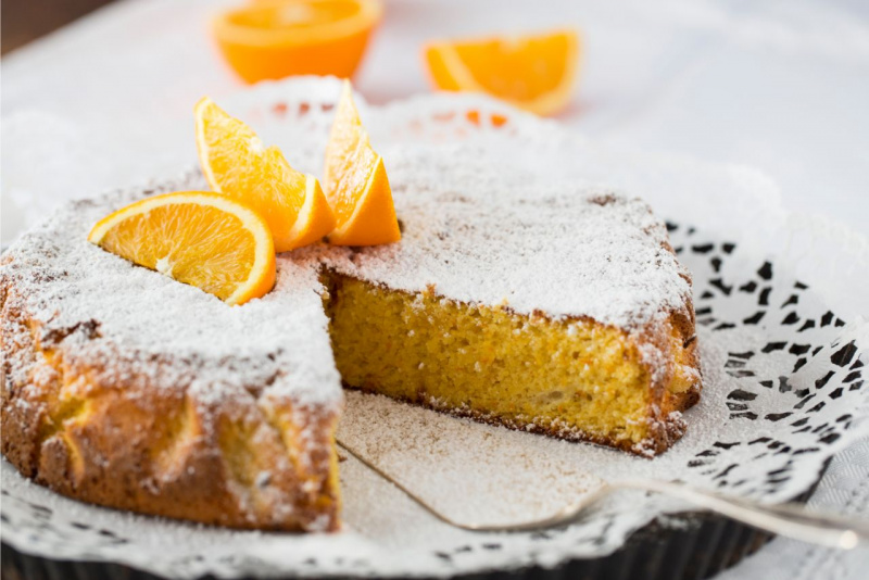 dolce pronto piatto portata torta fette arancia zucchero a velo